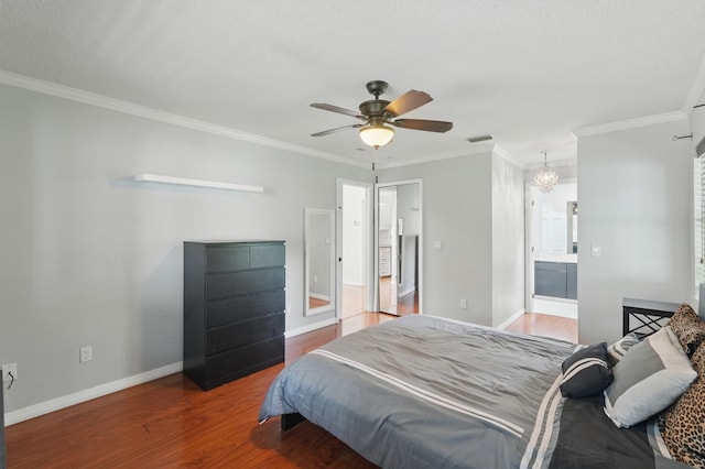 131 Boulder Rock Dr, Palm Coast, FL 32137 - bedroom featuring wood finished floors, crown molding, connected bathroom, a chandelier, and a ceiling fan
