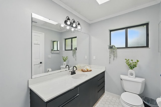 131 Boulder Rock Dr, Palm Coast, FL 32137 - bathroom featuring vanity, ornamental molding, and a skylight