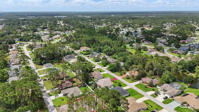 131 Boulder Rock Dr, Palm Coast, FL 32137 - aerial overview of property's location with nearby suburban area