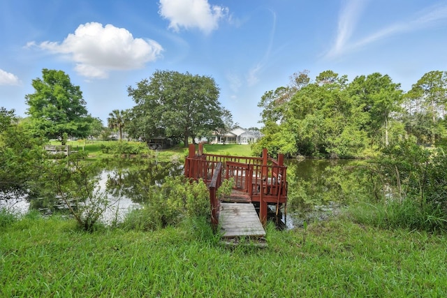 131 Boulder Rock Dr, Palm Coast, FL 32137 - dock with a deck with water view