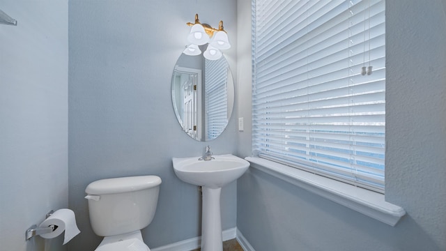 bathroom featuring toilet