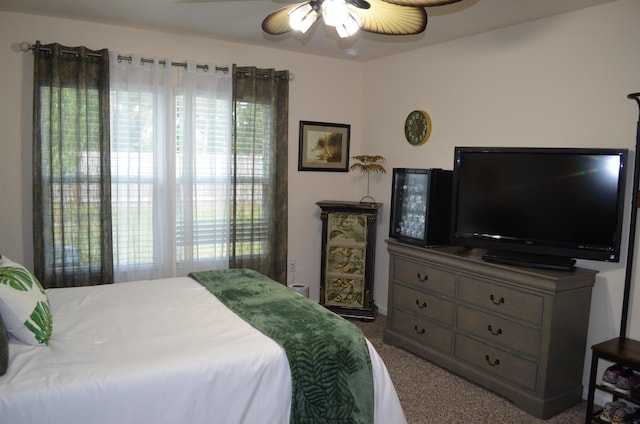 35 Putter Dr, Palm Coast, FL 32164 - carpeted bedroom with a ceiling fan