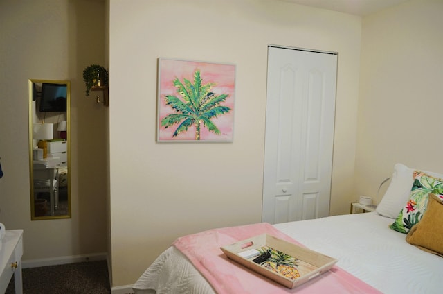 35 Putter Dr, Palm Coast, FL 32164 - carpeted bedroom featuring baseboards