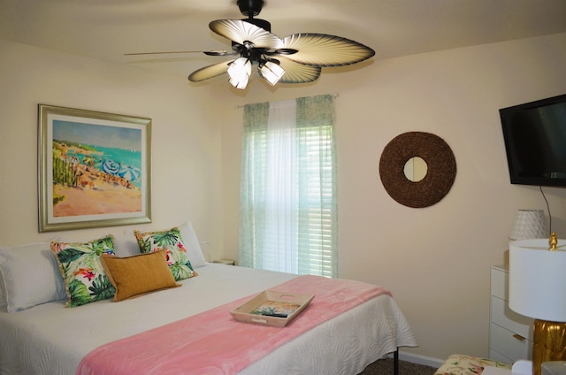 35 Putter Dr, Palm Coast, FL 32164 - carpeted bedroom with a ceiling fan and baseboards