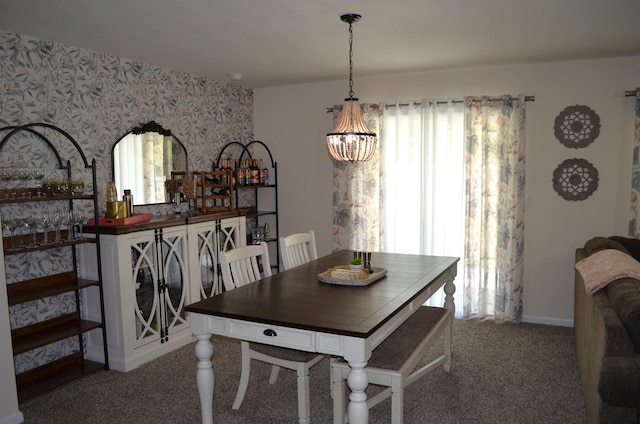 35 Putter Dr, Palm Coast, FL 32164 - carpeted dining area featuring a chandelier and wallpapered walls