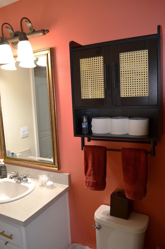 35 Putter Dr, Palm Coast, FL 32164 - bathroom with toilet and vanity