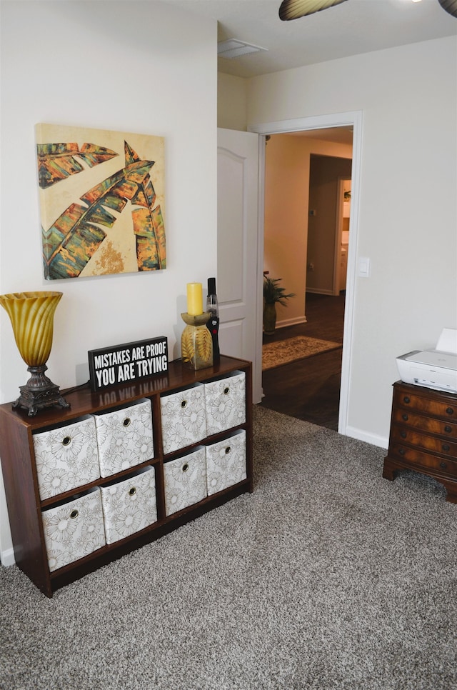 35 Putter Dr, Palm Coast, FL 32164 - hallway featuring carpet and baseboards