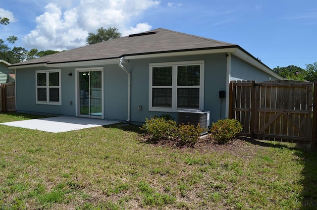 35 Putter Dr, Palm Coast, FL 32164 - rear view of house featuring a patio area and stucco siding