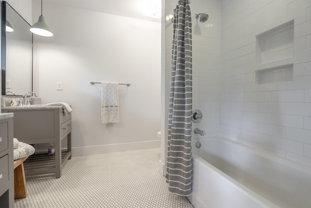 bathroom with vanity and shower / tub combo