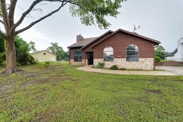 view of front of home with a front yard