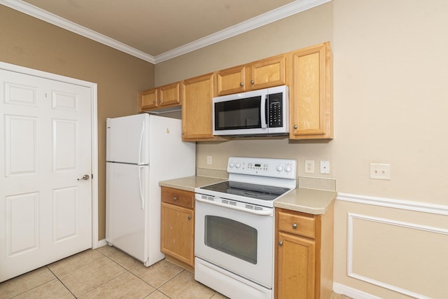 kitchen with crown molding, light tile patterned floors, and white appliances