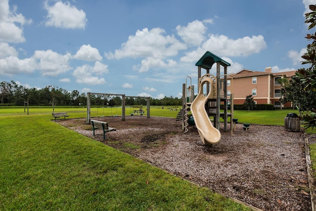 view of jungle gym with a lawn