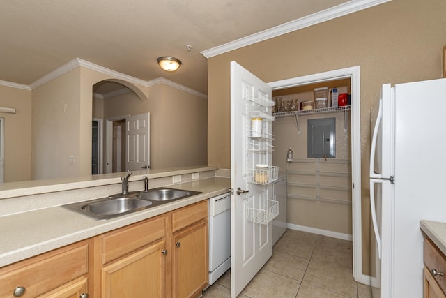 kitchen with light brown cabinetry, sink, ornamental molding, light tile patterned floors, and white appliances