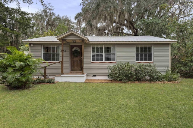 single story home with a front yard