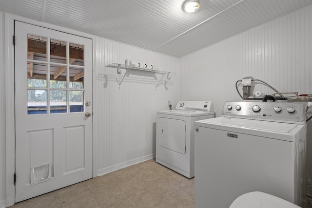 washroom with separate washer and dryer