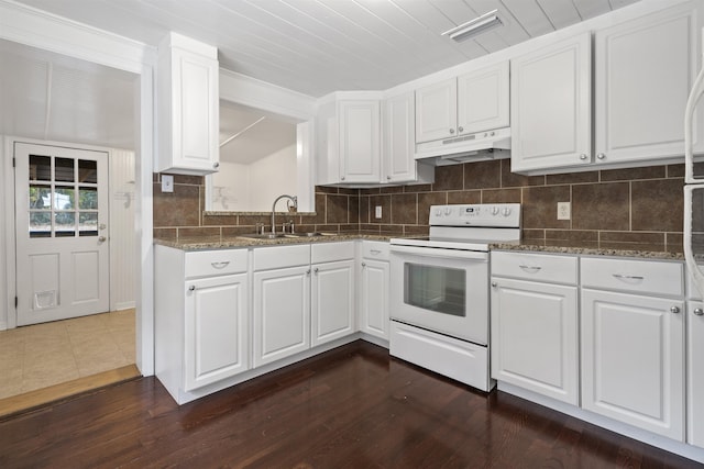 kitchen featuring white cabinetry, white range with electric stovetop, dark stone countertops, and sink