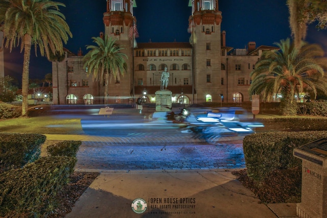 view of pool at night