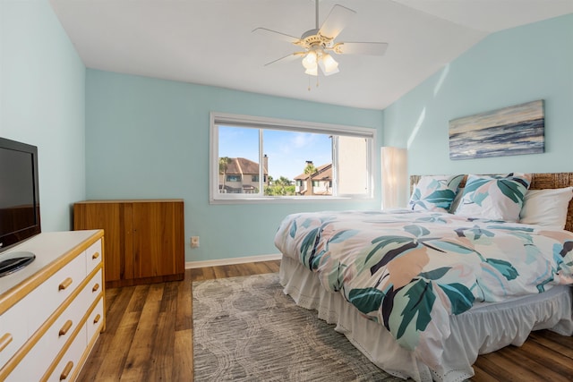 bedroom featuring lofted ceiling, ceiling fan, and wood finished floors