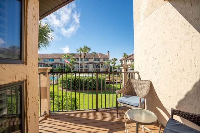 balcony featuring a residential view