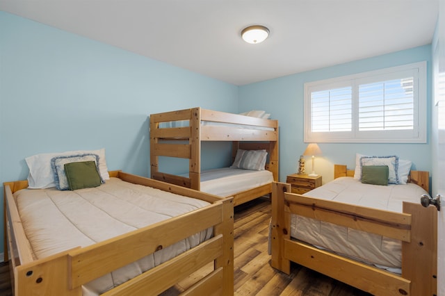 bedroom with wood finished floors