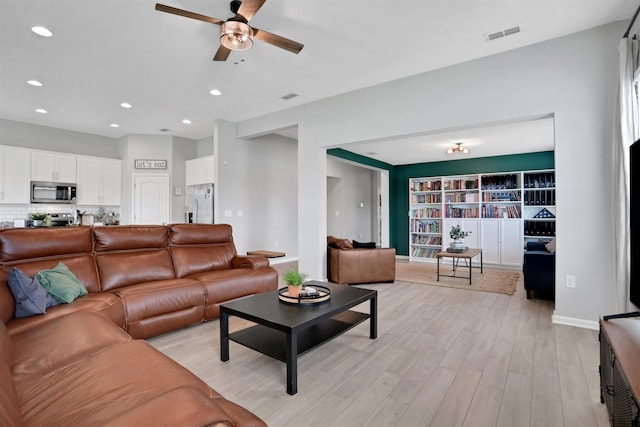 123 Hickory Ridge Rd, Saint Augustine, FL 32084 - living room with ceiling fan, light wood-style flooring, and recessed lighting