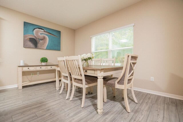 101 Sailors Landing Ct, Saint Augustine, FL 32084 - dining space featuring baseboards and light wood-style floors