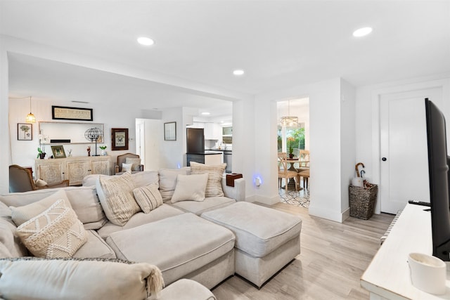 living room featuring light wood-type flooring