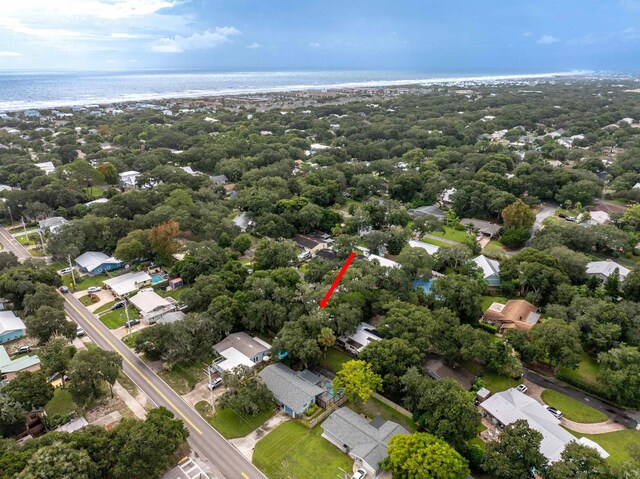 drone / aerial view with a view of the beach and a water view