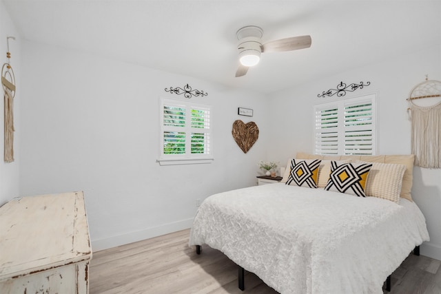 bedroom featuring ceiling fan and light wood-type flooring