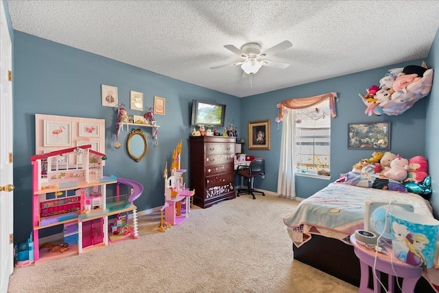 14 Serbian Bellflower Trl, Palm Coast, FL 32164 - bedroom featuring baseboards, a ceiling fan, carpet floors, and a textured ceiling