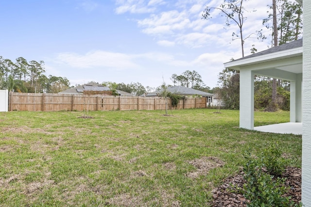 view of yard with fence