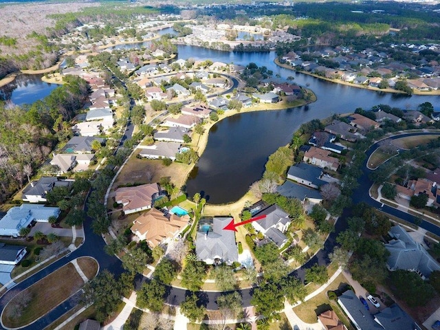 birds eye view of property featuring a water view