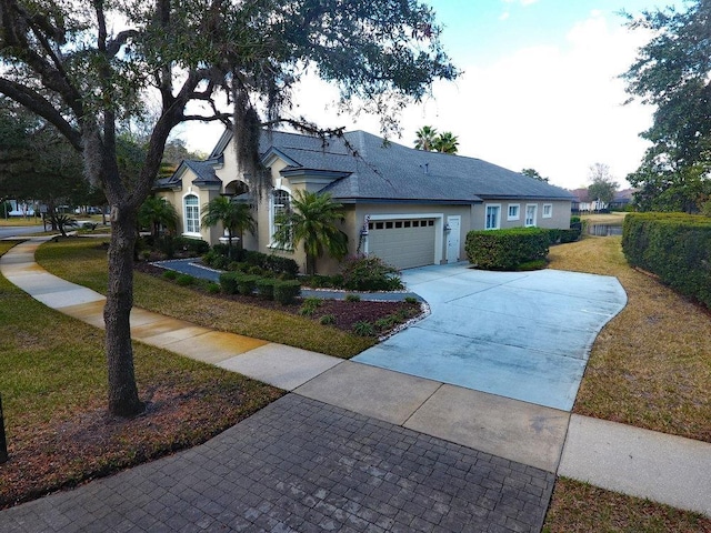 view of front of property featuring a garage