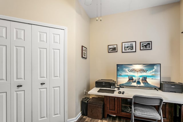 office area featuring ceiling fan and dark wood-type flooring