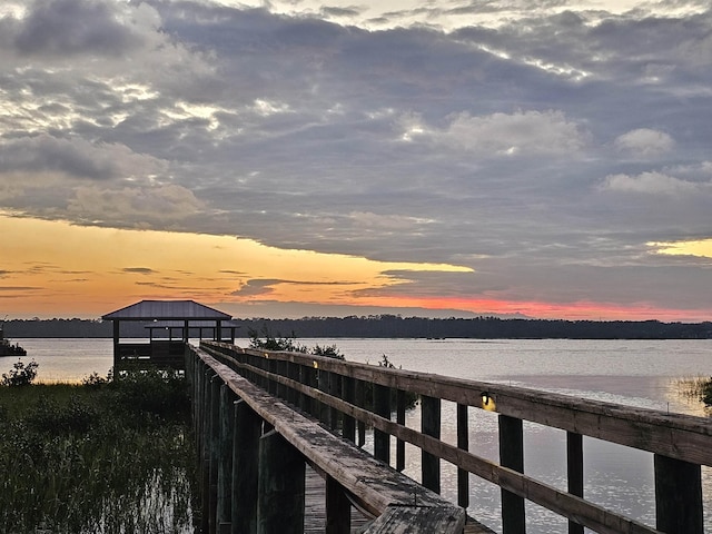 view of dock with a water view