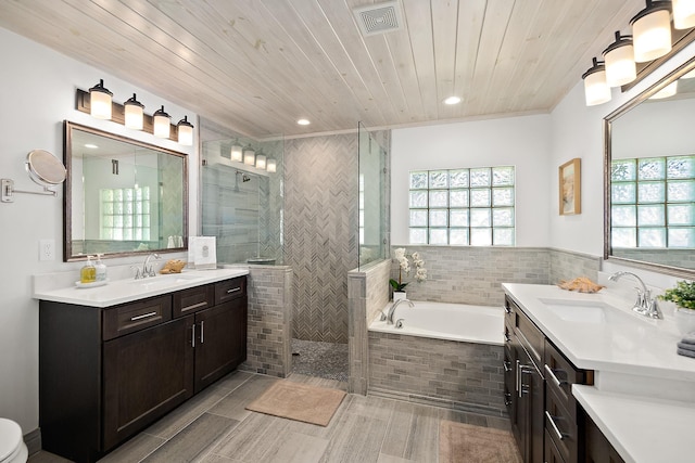 bathroom with wooden ceiling, vanity, and separate shower and tub