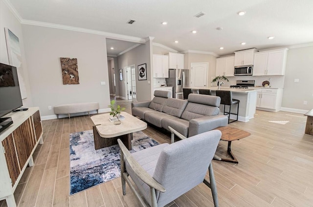 living room featuring ornamental molding