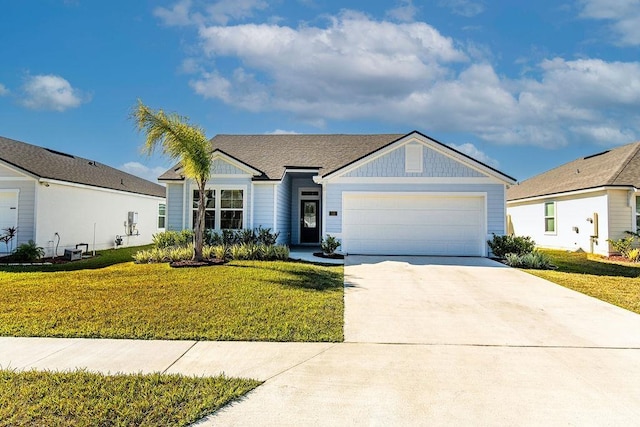 ranch-style home with a front yard and a garage