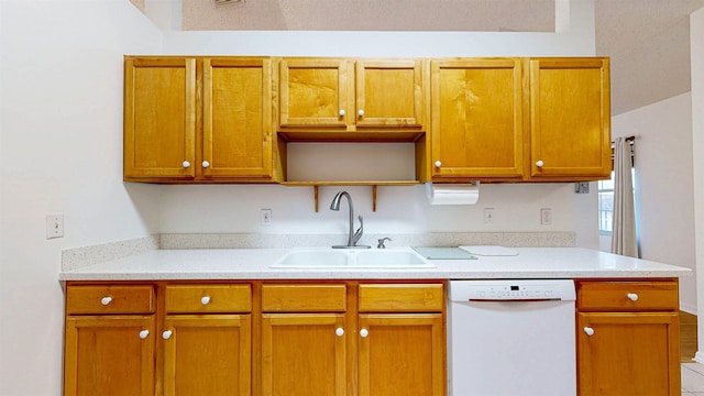 kitchen featuring a sink, open shelves, light countertops, and dishwasher