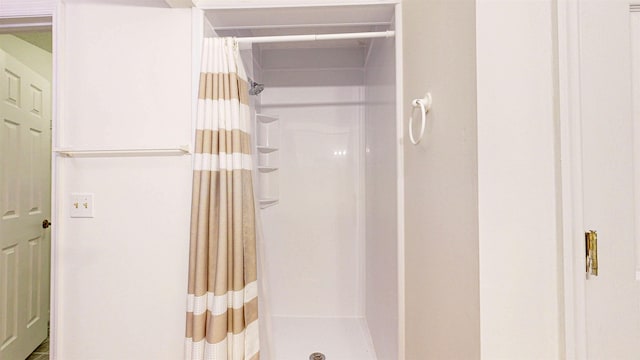 full bathroom with a stall shower