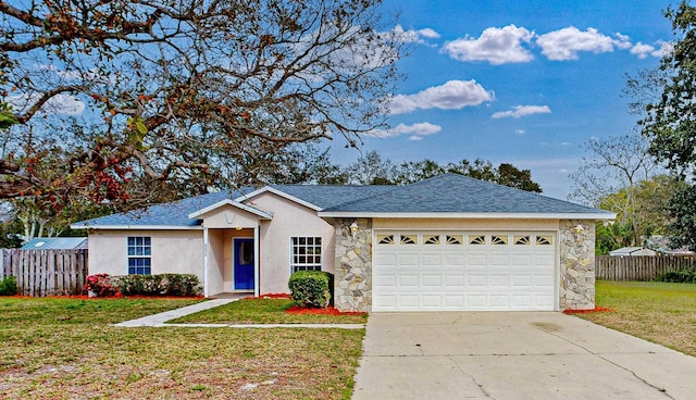 single story home featuring a garage, driveway, a front yard, and fence