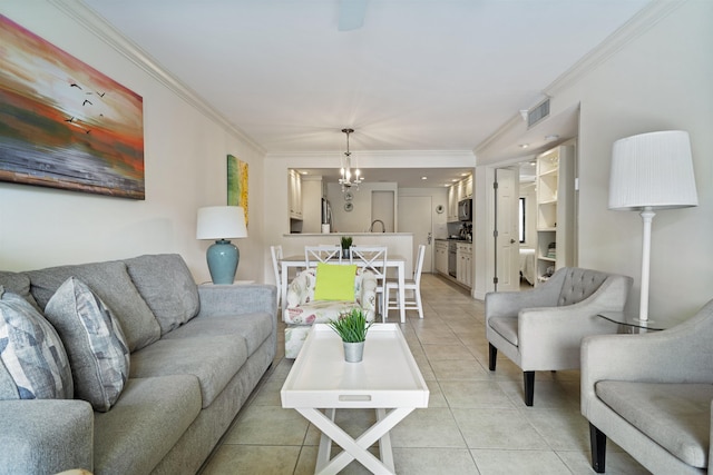 880 A1A Beach Blvd Unit 8106, Saint Augustine, FL 32080 - living room featuring visible vents, ornamental molding, a notable chandelier, and light tile patterned flooring