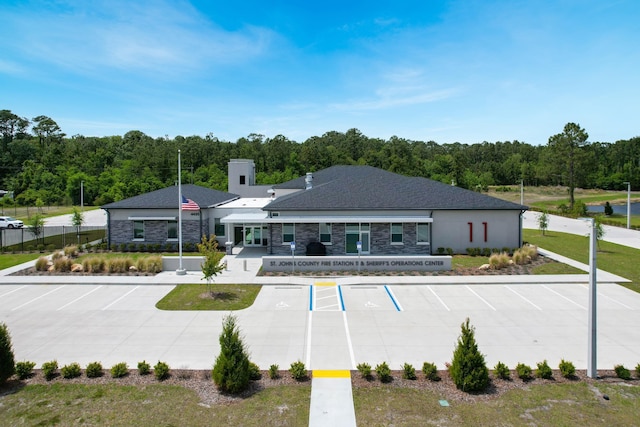 5351 Cypress Links Blvd, Elkton, FL 32033 - view of property featuring fence, uncovered parking, and a view of trees