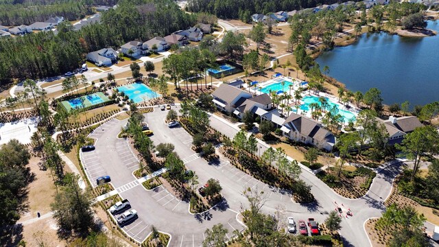 drone / aerial view with a water view