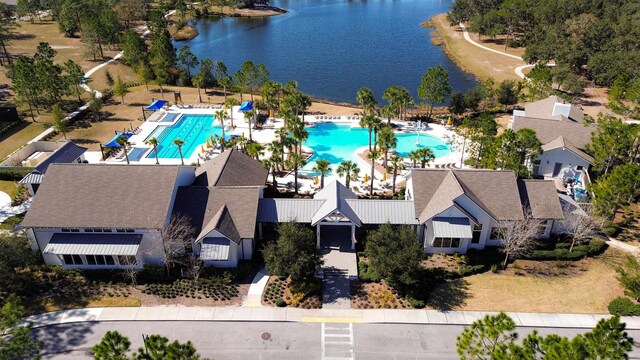 birds eye view of property featuring a water view