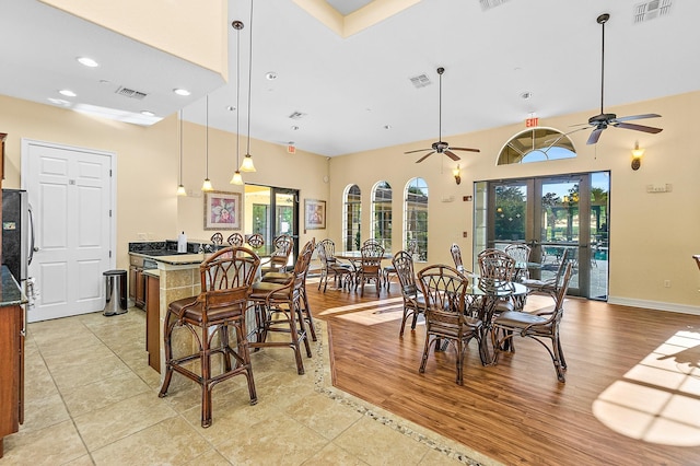 dining room featuring a healthy amount of sunlight and visible vents