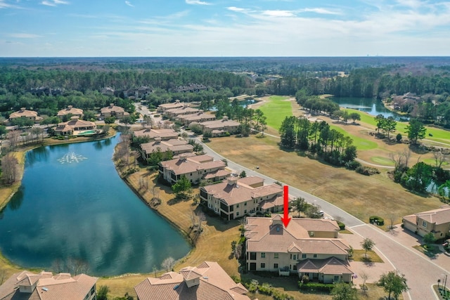 birds eye view of property featuring a residential view and a water view