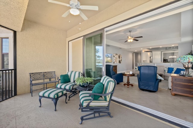 view of patio featuring outdoor lounge area and ceiling fan