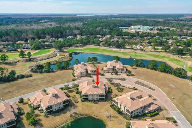 aerial view with a water view, a residential view, and golf course view