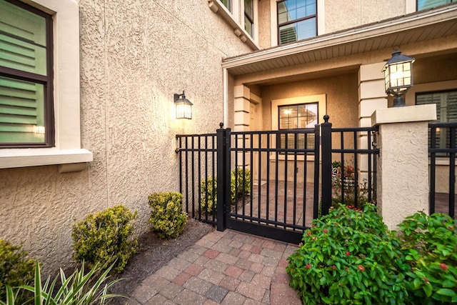 view of gate featuring fence